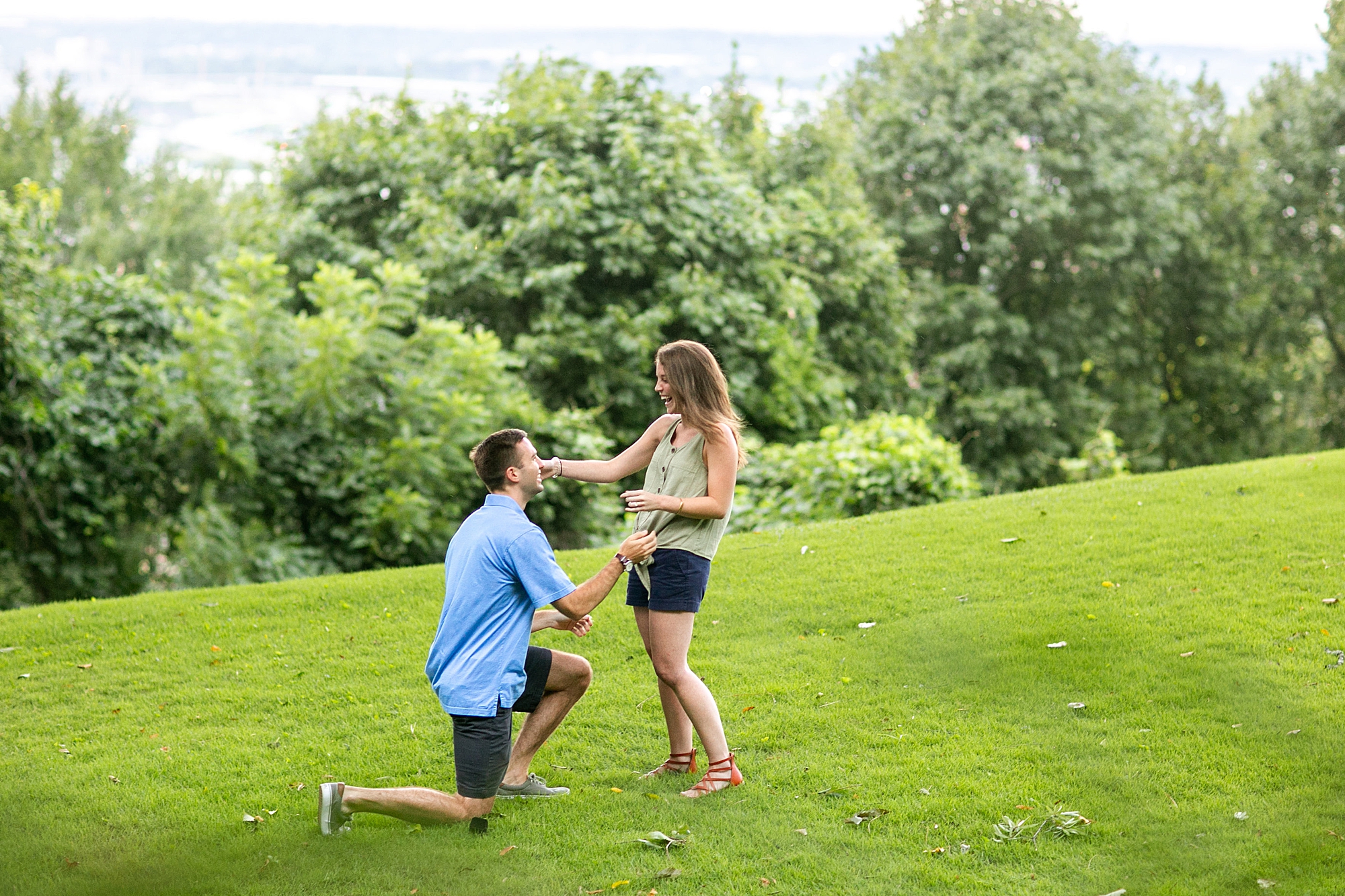 He surprised her on a mountain overlooking Birmingham, Alabama. The clouds and rain rolled in, but that didn't stop him from getting on one knee.