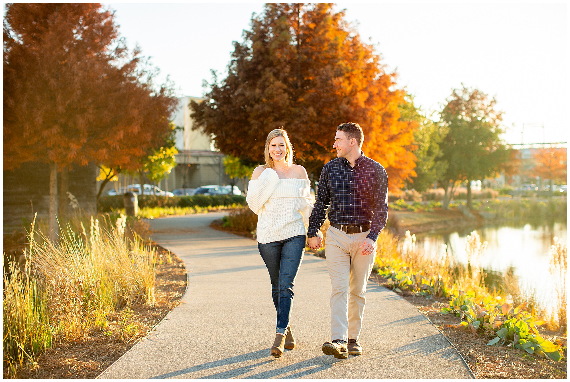 Railroad Park Engagement walking hand in hand