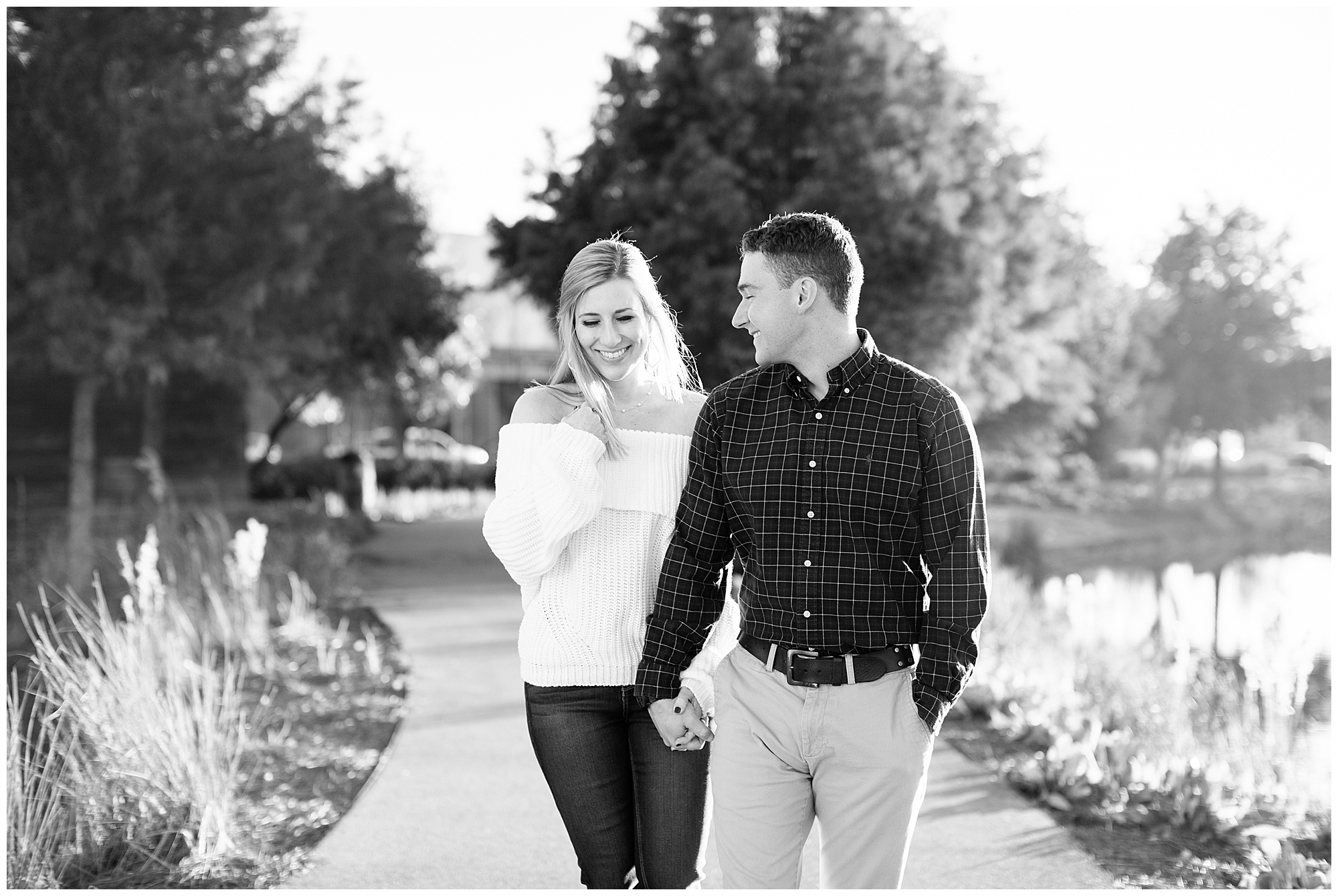 Railroad Park Engagement walking hand in hand